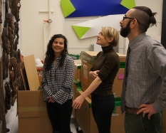 Left to right: Nikki, Meredith, and Andy in the museum’s offsite storage facility. Photo by Alison Palizzolo.