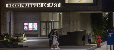 A nighttime photo of the Hood Museum of Art's facade. 