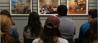 Students view three prints from Wendy Red Star's "The Four Seasons" in the Bernstein Center for Object Study.
