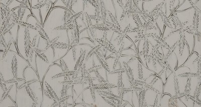 An Indigenous Australian bark painting painting with a soft gray background and outlines of plants are pressed into it.