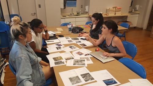 Hood interns discuss their group A Space for Dialogue installation. Photo by Amelia Kahl.