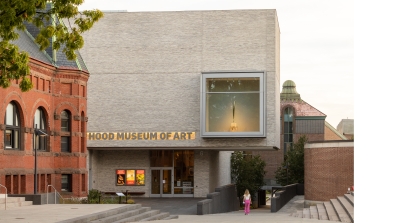 The facade of the Hood Museum of Art at dusk.