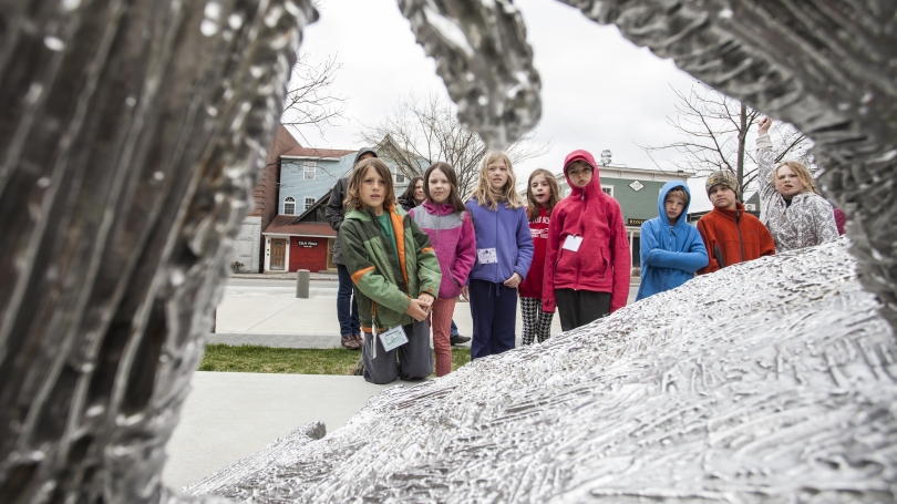 An ArtStart class takes a tour of outdoor sculpture. Photo by Tom McNeill.