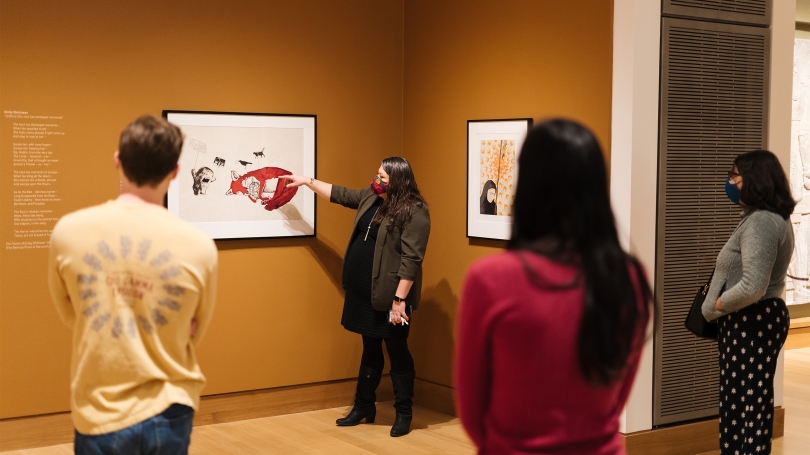 College students explore the Hood Museum of Art galleries on a Tiny Tour with Curator of Indigenous Art Jami Powell.