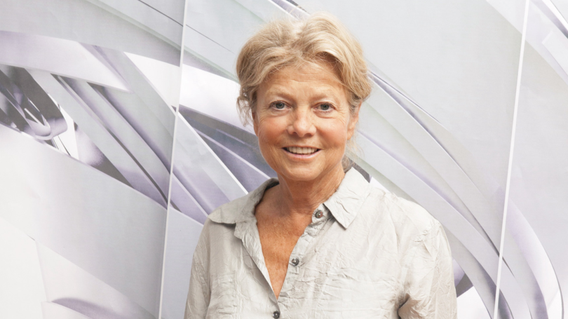 Portrait of Alice Aycock. A woman with blonde hair and a white collared shirt. 