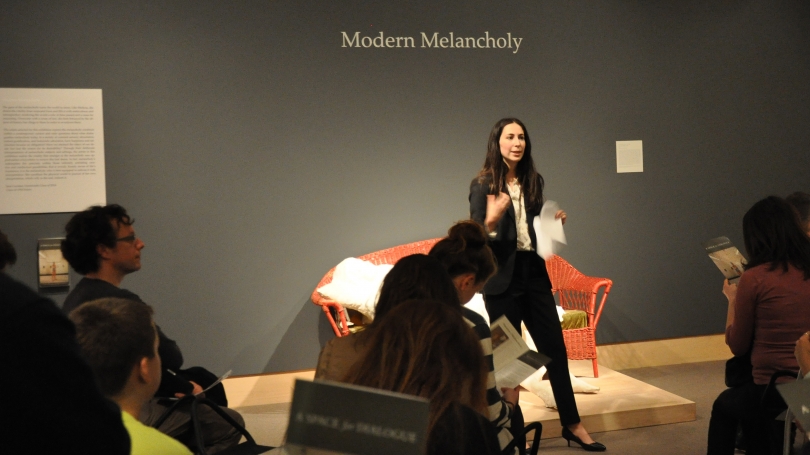 Jane Cavalier discussing her A Space for Dialogue installation titled Modern Melancholy, examined the melancholic condition within a contemporary context and raised questions about what distinguishes melancholy today. Photo by Sharon Reed.