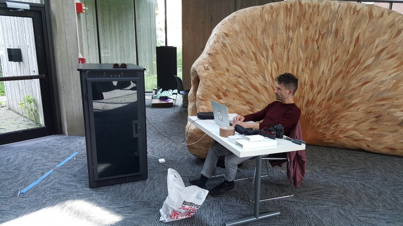 Jacob Kirkegaard adjusts the sound to fit the space of the Fairchild atrium.