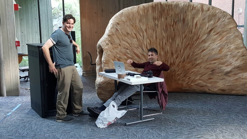 Spencer Topel (left) and Jacob Kirkegaard (right) during the installation of Transmission.