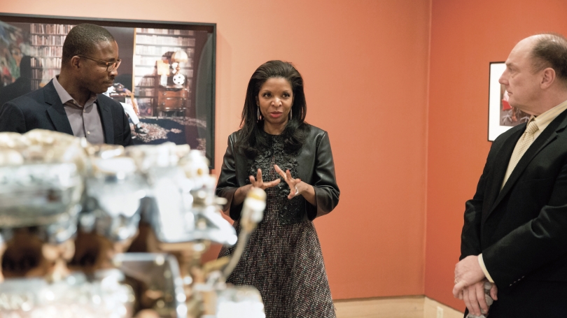 Ugochukwu-Smooth Nzewi, Curator of African Art at the Hood Museum of Art, with Pamela Joyner and John Stomberg in the winter 2016 exhibition Inventory: New Works and Conversations Around African Art. Photo by Robert Gill.