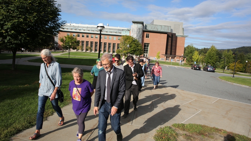 Hood Museum of Art Head of Exhibitions Design and Planning Patrick Dunfey (right) leads the symposium walking tour away from Bill Fontana’s MicroSoundings.