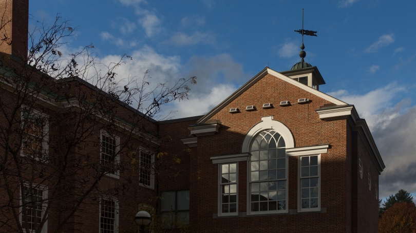 Exterior of Cummings Hall. The five solar panels of Spikes are mounted above the windows. 