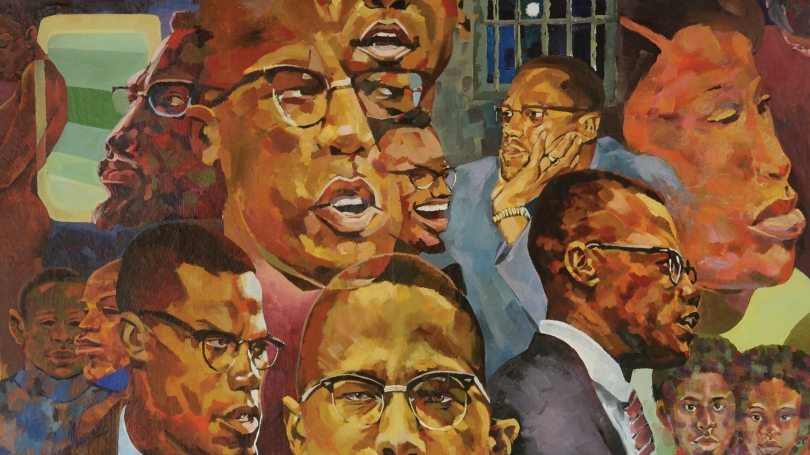 A painted mural depicting portraits of people of color, their ages vary. The portraits are from the shoulders or neck up and are looking in different directions. Malcolm X is shown multiple times.