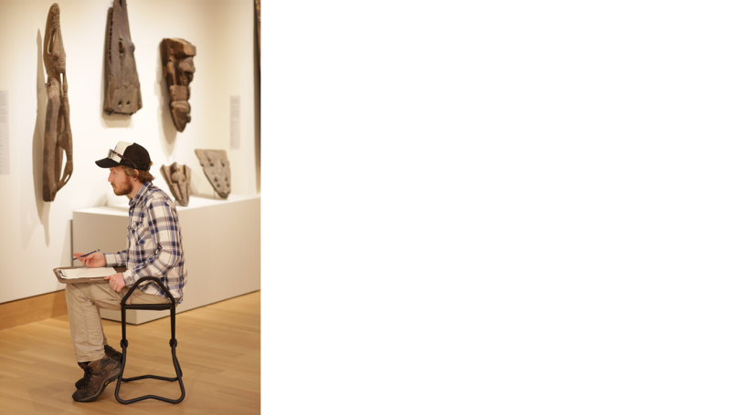 A Dartmouth student sketches in the galleries. Photo by Rob Strong 