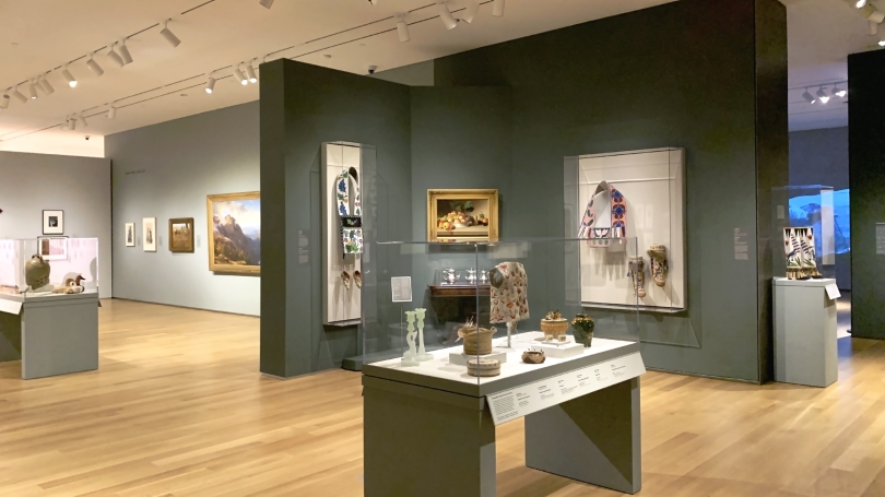A museum gallery installed with African American, Indigenous American, and European American traditional and contemporary art.